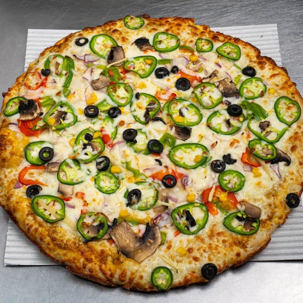 Moon Pizza's large, round vegetarian pizza with jalapeños, olives, mushrooms, and bell peppers.